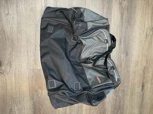 Protege Sport Large Black and Gray Heavy Duty Rolling Duffle Bag with Multiple P